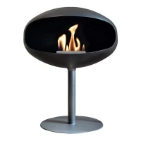 Cocoon Pedestal - Black with a Black Base, a freestanding bioethanol fireplace with a modern design and eco-friendly heating.