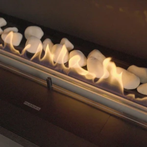 Tray of White Ceramic Stones by Planika, a premium decorative accessory for bioethanol fireplaces.