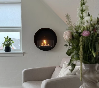 Delaware S Round Design Fireplace Ø50 cm - ScandiFlames Delaware S Round Design Fireplace by ScandiFlames, a sleek Ø50 cm wall-mounted bioethanol fireplace in black.