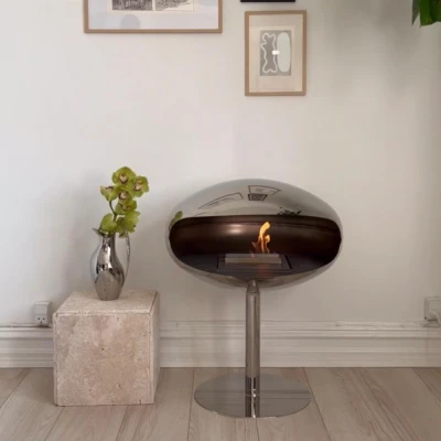 Cocoon Pedestal - Polished Steel bioethanol fireplace with a sleek, freestanding design and polished steel finish.