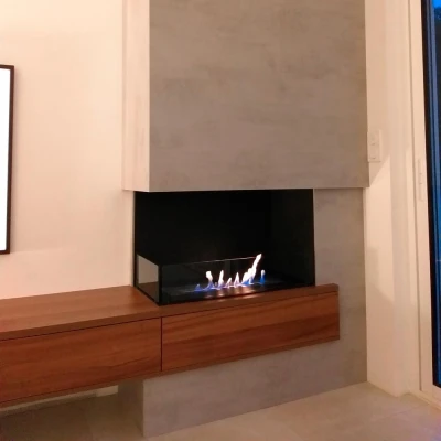 Foco Corner Left 800 Bioethanol Fireplace | Buy Now Foco Corner Left 800 bioethanol fireplace in black finish with a two-sided view for modern interiors.