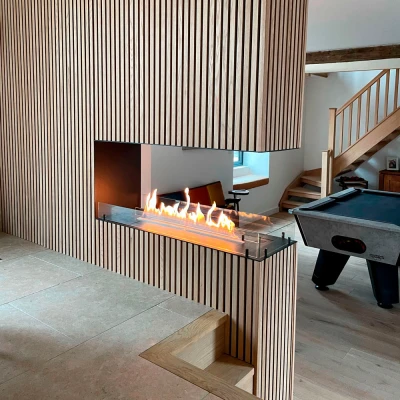 Foco Room Divider 1200 | Luxury Built-in Bioethanol Fireplace Foco Room Divider 1200 – A sleek, three-sided built-in bioethanol fireplace in black with remote, automatic, and manual control