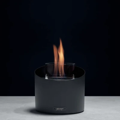 Contour Table Fireplace - Black by GlammFire, a sleek and modern bioethanol tabletop fireplace with a 20 cm length and 3-hour bu