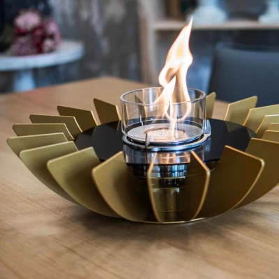 Cosmo Table Fireplace - Golden by GlammFire, a luxurious tabletop bioethanol fireplace with a sleek design and clean-burning fla