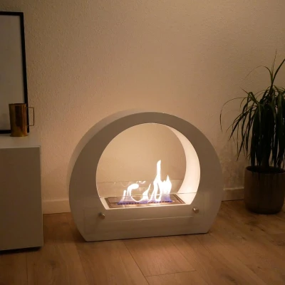 ScandiFlames Bio Fireplace with Arch - White, a modern floor-standing bioethanol fireplace with a sleek curved design and manual