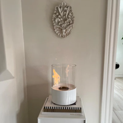 Kennington Round Tabletop Bioethanol Fireplace in White by ScandiFlames. Stylish and compact design with a 0.5L capacity and man