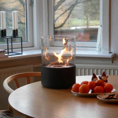 Kennington Round Tabletop Bioethanol Fireplace - Black with a sleek, modern design and clean-burning flame.