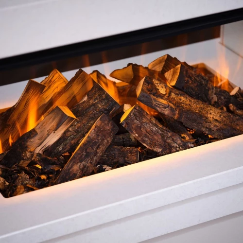 Deluxe Real Logs decoration wood set for British Fires electric fireplace, offering a realistic and elegant enhancement.