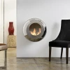 Cocoon Vellum Polished Steel wall-mounted bioethanol fireplace with a sleek and modern design.