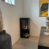 Alaska Corner Bioethanol Stove Fireplace by ScandiFlames – a sleek black bioethanol stove designed for corner placement.