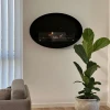 Maryland Oval Wall Hanging Slim Fireplace by ScandiFlames – a sleek and modern black bioethanol wall-mounted fireplace.