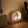 ScandiFlames Bio Fireplace with Arch - White, a modern floor-standing bioethanol fireplace with a sleek curved design and manual