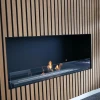 Foco One 1000 bioethanol fireplace by FOCO Fires, a sleek built-in one-sided fireplace with remote control and black finish.