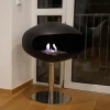 Cocoon Pedestal Matte Black with Steel Pedestal - A modern floor-standing bioethanol fireplace with a sleek design and stainless