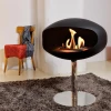 Cocoon Pedestal Matte Black with Steel Pedestal - A modern floor-standing bioethanol fireplace with a sleek design and stainless