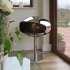 Cocoon Pedestal - Polished Steel bioethanol fireplace with a sleek, freestanding design and polished steel finish.