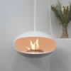 Cocoon Aeris White ceiling-mounted bioethanol fireplace with a sleek, modern design and clean-burning flame.