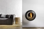 Cocoon Vellum Matte Black wall-mounted bioethanol fireplace with sleek modern design and 3 kW heat output.