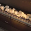 Tray of White Ceramic Stones by Planika, a premium decorative accessory for bioethanol fireplaces.