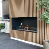 Foco One 1200 bioethanol fireplace with black finish, designed for built-in one-sided installation.