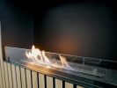 Foco One 800 bioethanol fireplace by FOCO Fires – a sleek, built-in one-sided fireplace with remote and manual control, offering