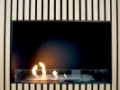 Foco One 800 bioethanol fireplace by FOCO Fires – a sleek, built-in one-sided fireplace with remote and manual control, offering