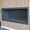 Exterior Frame for Foco 1800 in black, designed for seamless fireplace integration.