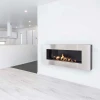 Apollo - Brushed Steel bioethanol fireplace by GlammFire, wall-mounted with a brushed steel finish, modern design, and remote co