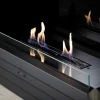 York - Black bioethanol fireplace by GlammFire, a sleek insert with remote control and 10-hour burn time, designed for existing 