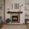 Hinton Cast Iron Electric Fireplace by British Fires in black, featuring a freestanding cast iron design with remote and panel c