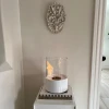 Kennington Round Tabletop Bioethanol Fireplace in White by ScandiFlames. Stylish and compact design with a 0.5L capacity and man