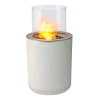 Planika Jar with Concrete Base – Stylish freestanding bioethanol fireplace in white with a concrete base for outdoor use.