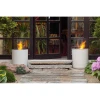 Planika Jar with Concrete Base – Stylish freestanding bioethanol fireplace in white with a concrete base for outdoor use.
