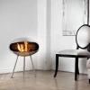 Cocoon Terra Polished Steel Bioethanol Fireplace with Steel Legs - Elegant and modern floor-standing design.
