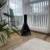 Salem Steel Bio Fire by ScandiFlames – a black bioethanol stove with a wood burner design, offering a cosy ambience and efficien