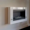 Nebraska White Wall-Mounted Biofireplace by ScandiFlames, a sleek and modern bioethanol fireplace with a white finish.