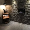 Nevada Wall Mounted Bioethanol Fireplace by ScandiFlames in black, sleek and modern design.