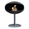 Cocoon Pedestal - Black with a Black Base, a freestanding bioethanol fireplace with a modern design and eco-friendly heating.
