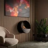 Bubble Wall bioethanol fireplace – a sleek, wall-mounted black fireplace with remote control and automatic operation.