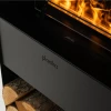 Steamy Opti-myst Fireplace – sleek black floor-standing vapour fireplace with remote control and realistic flame effect.