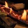 Decorative Set for Planika Stone Bioethanol Fireplace featuring high-quality ceramic logs for an authentic and elegant look.