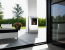 Safretti Cubico XL bioethanol fireplace in brushed stainless steel, a modern floor-standing heating solution.