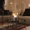 Planika Commerce Stainless Steel bioethanol fireplace – freestanding tabletop design with a sleek stainless steel finish.