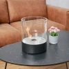 Southwark Black Round Tabletop Bioethanol Fireplace by ScandiFlames, a sleek and modern tabletop fireplace with a 3-litre capaci