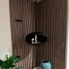 Cocoon Aeris Matte Black with Black Rod – a ceiling-mounted bioethanol fireplace with a sleek matte black finish and modern desi