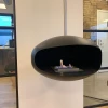 Cocoon Aeris Black with Steel Mounting Pole – a modern ceiling-mounted bioethanol fireplace with a sleek black finish and durabl