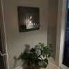 ScandiFlames Elegant Black Wall-mounted Fireplace - Modern wall-mounted bioethanol fireplace with a sleek black finish and 6-hou