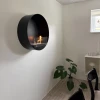 Delaware Black Round Wall Mounted Biofireplace by ScandiFlames - A modern, space-saving bioethanol fireplace with a sleek black 