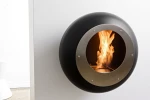Cocoon Vellum Matte Black wall-mounted bioethanol fireplace with sleek modern design and 3 kW heat output.