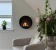 Delaware S Round Design Fireplace by ScandiFlames, a sleek Ø50 cm wall-mounted bioethanol fireplace in black.